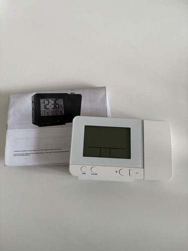Sleek white projection alarm - projection,