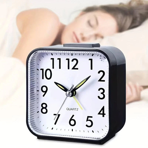 Quartz alarm clock with - alarm,