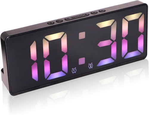 Digital alarm clock with dual - alarm,